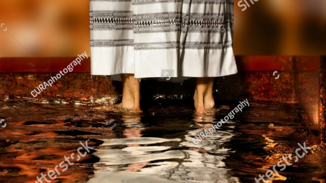 Robed and Ready: The Significance of Pastor Baptism Robes